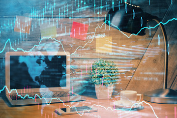 Multi exposure of graph and financial info and work space with computer background. Concept of international online trading.