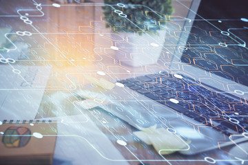 Technology theme drawing and table with computer. Double exposure. Concept of information.