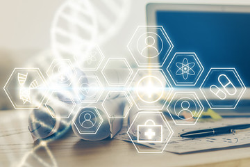 Desktop computer background and DNA drawing. Double exposure. Science concept.