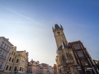Fototapeta na wymiar Panorama of Old Town Square (Staromestske Namesti) with a focus on the clock tower of Old Town Hall, a major landmark of Prague, Czech Republic, also called staromestska radnice
