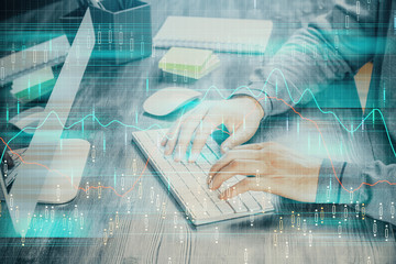 Double exposure of financial graph with man works in office on background. Concept of analysis.