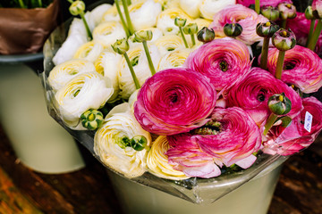 Bouquets of various ranunculus on flower street market