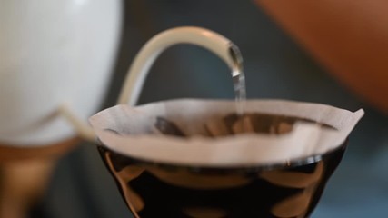Making coffee drip Hand drip Coffee Pouring hot water on coffee ground Home brewing Hipster lifestyle