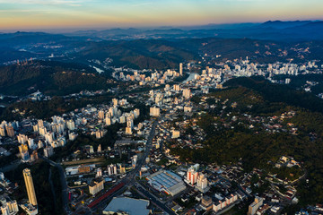 Obraz premium Aerial view of Blumenau City and Itajaí River