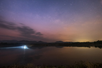 Stars and the Milky Way in the dark night sky are very beautiful.