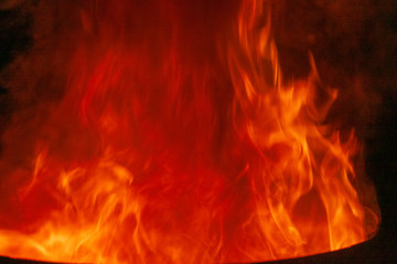Texture of fire. Orange bright flame. Photo of a burning bonfire in a fire.
