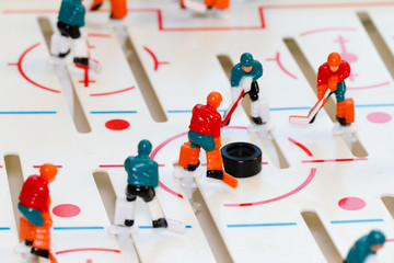 Naklejka premium A old fashion manual hockey game for kids macro view.