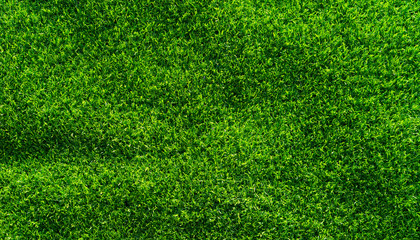 Close up of beautiful Artificial grass texture on the beach in summer time as background