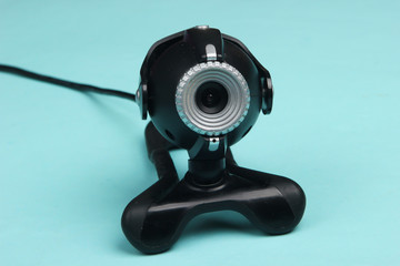 Webcam close-up on a blue background. I see you!