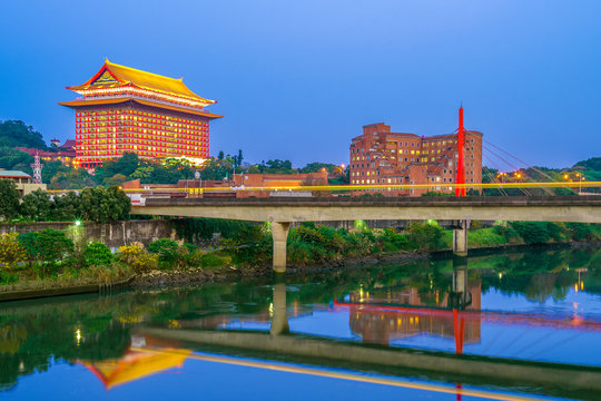 landscape of taipei by the river with grand hotel