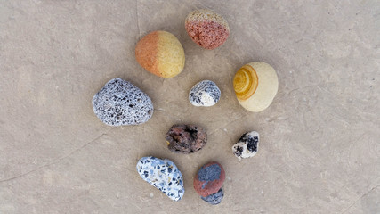 Collection of colorful stones found on a beach in Malta
