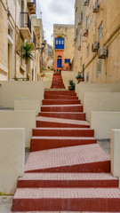 Fototapeta na wymiar A flight of crooked steps in Msida, Malta
