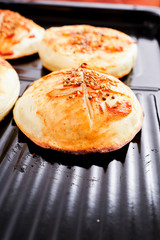 The toasted steamed bread on the plate