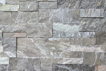 Gray stone wall closeup background photo texture
