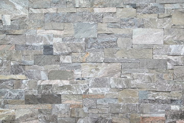Gray stone wall closeup background photo texture