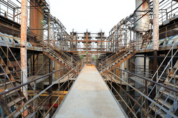 Unused and abandoned metal pipes in factories