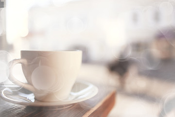cup in an outdoor cafe / breakfast concept in a cafe, coffee, tea, morning drink