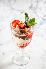 summer dessert with strawberries and ice cream