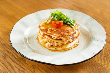 potato pancakes with chicken and salad
