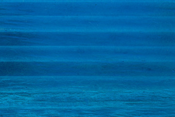 Obraz premium Plastic texture with blur effect in navy blue color.