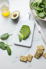 vegetarian food salad, avocado, chickpeas, spinach, olive oil with snack