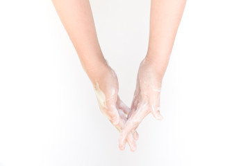 Step 4 fingers interlaced. Kid hand using soap to wash.