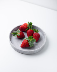 Summer healthy fruit composition with red strawberries