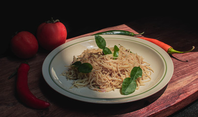 A dish of noodle or spaghetti