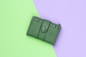 Fashionable leather wallet on pastel background. Top view