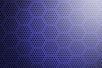 Abstract background is a blue grid for the speaker close-up. Details audio equipment.