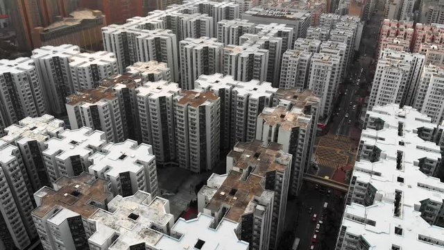 4K UHD aerial drone shot of old dense Hong Kong buildings