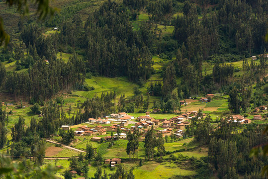 Aerial panoramic view of a rural town surroanded by eucalyptus trees in Conchucos Valley, Ancash Region, Peru