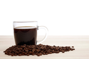 instant coffee in glass mug with roasted coffee beans with copy space, suiatble for header or banner