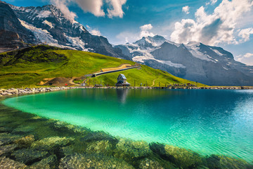 Turquoise lake and high mountains with glaciers, Bernese Oberland, Switzerland
