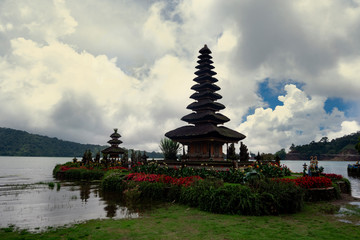 Fototapeta na wymiar Pura Ulun Danu temple panorama at sunrise on a lake Bratan, Bali, Indonesia