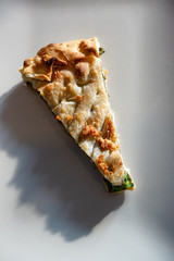 Savory pie with vegetables, closeup . Italian food name is : Erbazzone