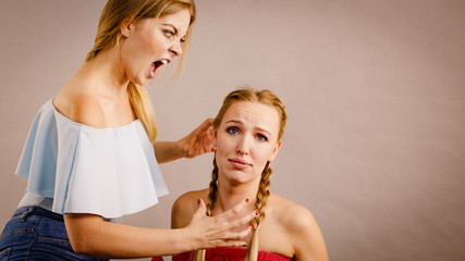 Two women having argue fight