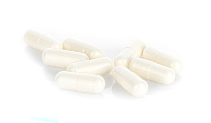Capsule of medication isolated on white background
