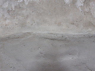  Uneven cement wall texture requiring repair