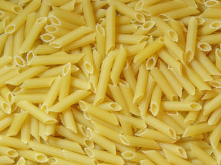 Pasta. Tubular pasta close -up background. Pasta. Macaroni.
