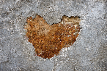 stone background with rusty heart