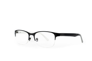 Simple glasses bold black frame on the top of lens. It's isolated from background and  lays on the white background in studio light.