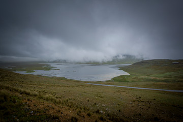 Conococha lake at a foggy day in Ancash, Peru