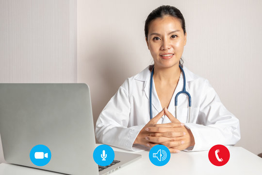 Woman Doctor With A Laptop For Video Call