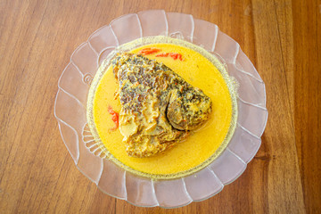 Delicious head fish curry, in indonesia called gulai kepala ikan is indonesian traditional food