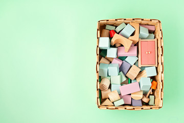 Flat lay with wooden  blocks in pastel colors. Eco friendly, zero waste, plastic free, educational, gender neutral toys for children