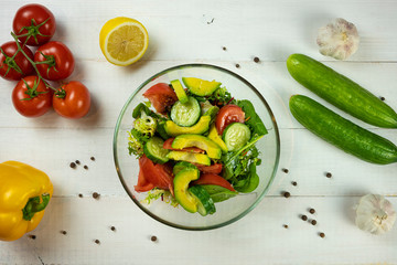  salad with lettuce avocado tomatoes and cucumber