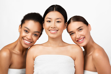Mixed Girls Wrapped In Towels Smiling Posing In Studio