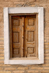 Traditional old wooden door. Itchan Kala (old or inner town), Khiva (Xiva), Uzbekistan.