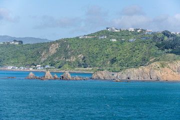 rock cliffs at Owhiro bay cape, Wellington, New Zealand